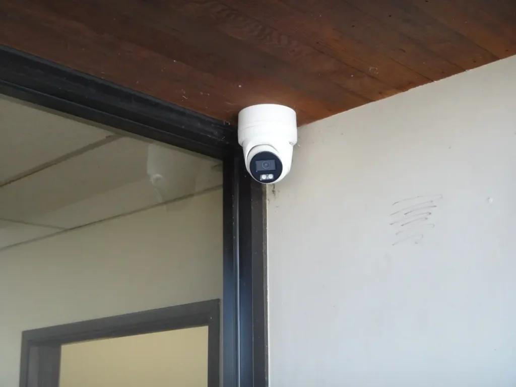4K security camera installed at office entrance for surveillance and deterrence