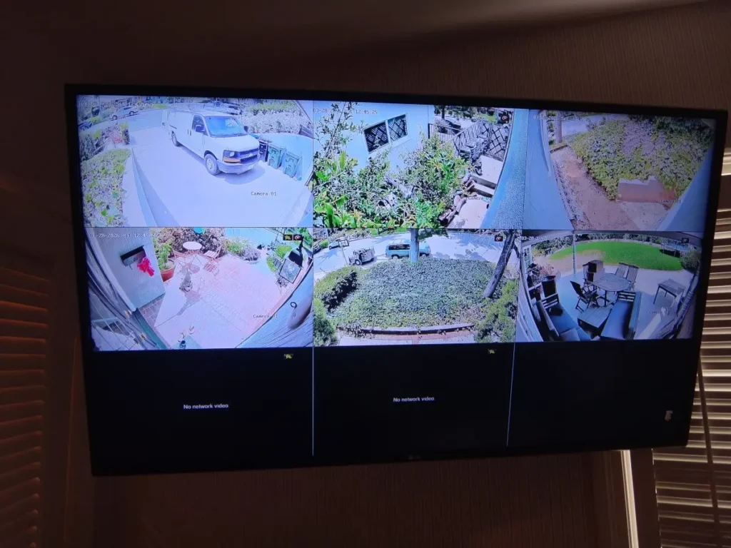 security camera system monitor displaying live view of multiple cameras in Whittier CA