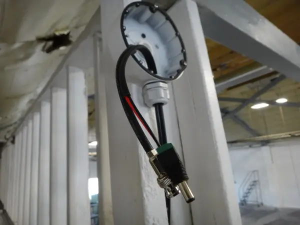Junction box with security camera connectors during installation