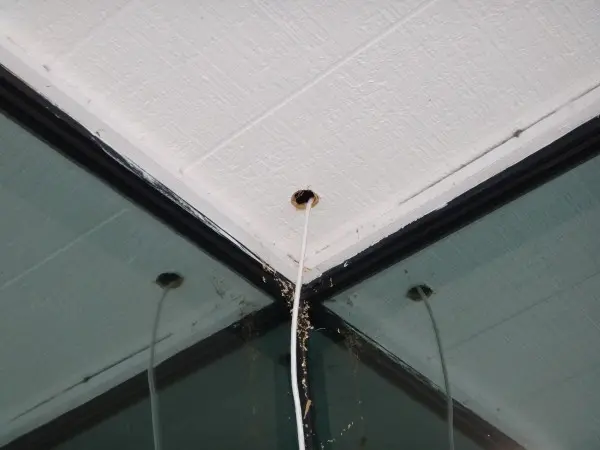 Pre-installation view of 2-way audio surveillance camera setup in Garden Grove warehouse environment