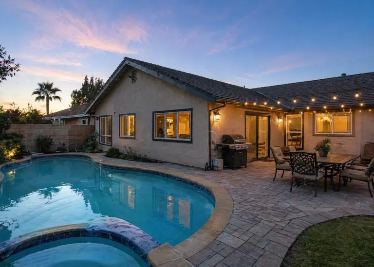 Residential backyard security camera installation in Cerritos CA with pool area