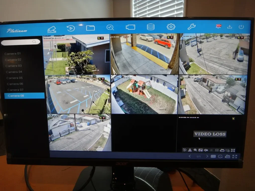 Security camera system live view on DVR monitor showing multiple cameras in La Mirada CA