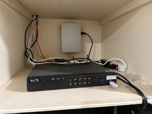 DVR security camera system and power supply during troubleshooting and maintenance service