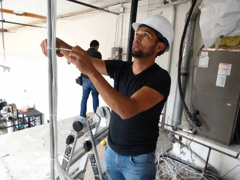 Professional security camera installation in Cypress California technician at work