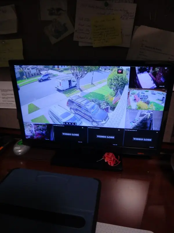 Security camera monitor showing restored image quality after maintenance and troubleshooting service in Long Beach CA