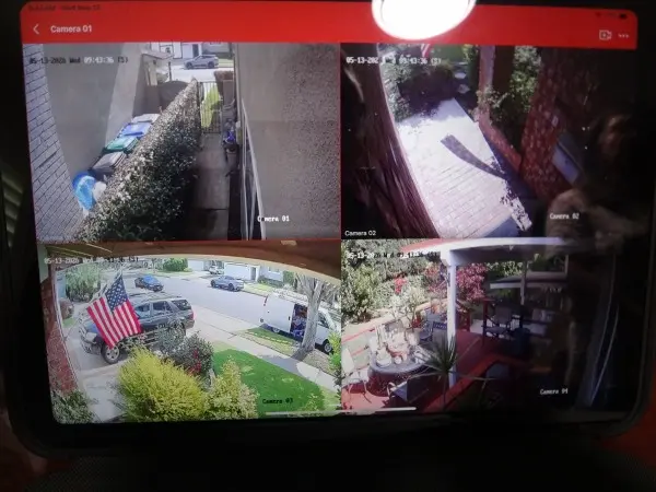 Security camera monitor view before camera cleaning and maintenance service