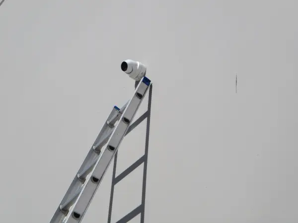 Camera mounted on a building exterior for commercial property on commerce ca