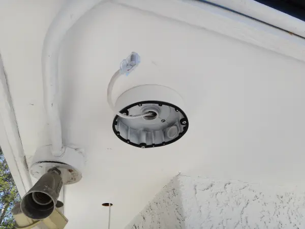 Outdoor security camera junction box and network cable prepared for installation