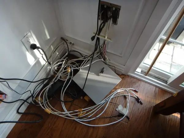 Before security camera installation showing exposed wiring before NVR installation in Fullerton, CA