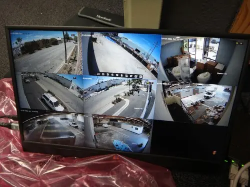 Live view of multiple commercial security cameras displayed on the monitoring system after installation in Santa Fe Springs, CA.