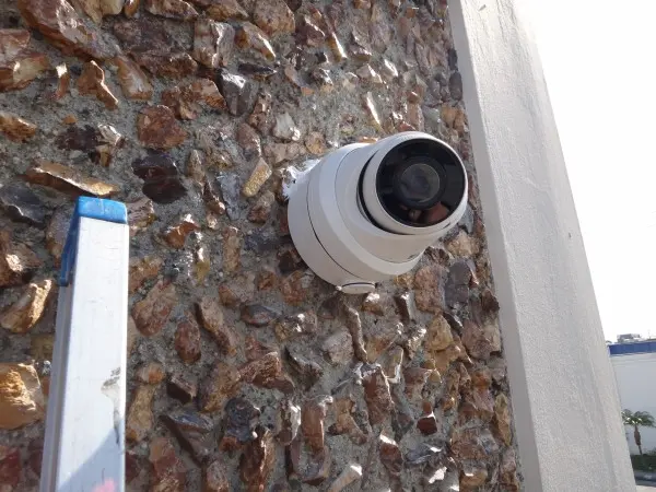 Commercial street-view security camera professionally installed on a weatherproof junction box