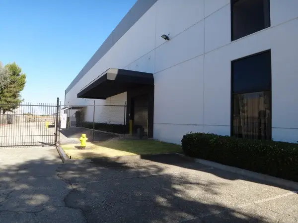 Main entrance of a commercial warehouse protected by a security camera system