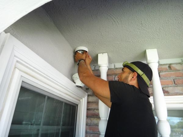 Installing a two-way audio security camera at the front entrance of a home in Fullerton, CA