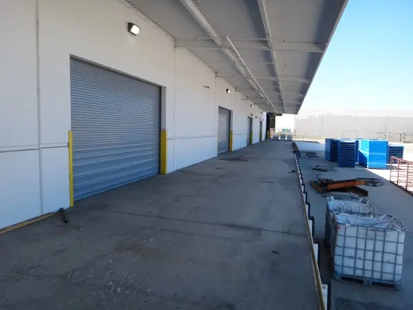 Receiving dock area of a commercial warehouse where Protection4Less installed 14 security cameras in Paramount.