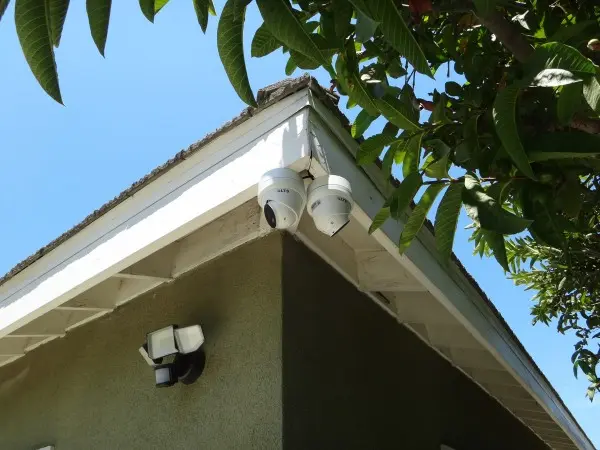 Two 4K security cameras installed under roof eave in Pico Rivera, CA