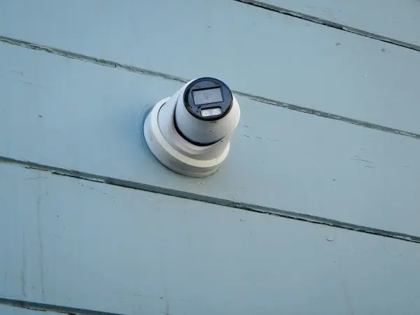 Security camera facing the main entrance of an apartment building in South Gate, CA