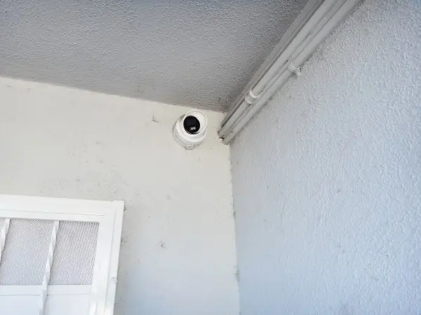 ecurity camera installed at corner of apartment building