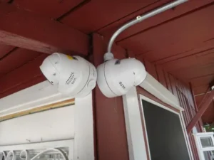 Two security cameras covering the entrance and side of a home in Whittier, CA