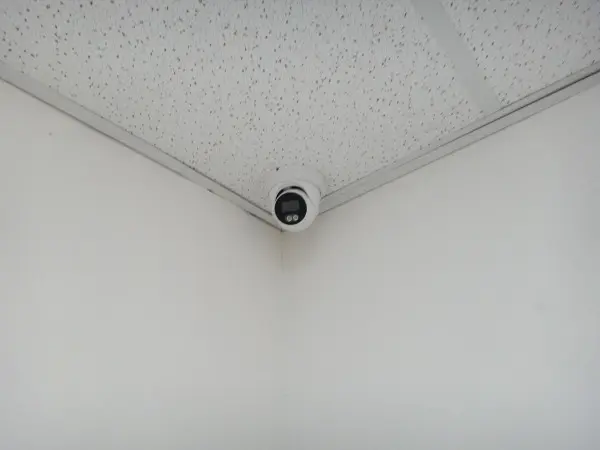 5MP security camera installed in the corner of a main office